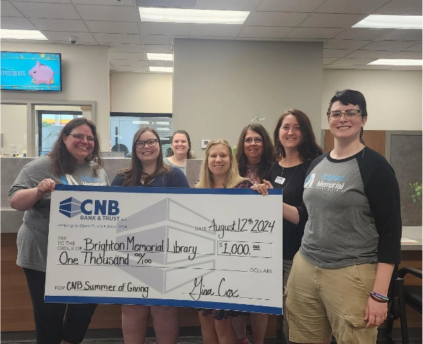 CNB presents check to Brighton Memorial Library District